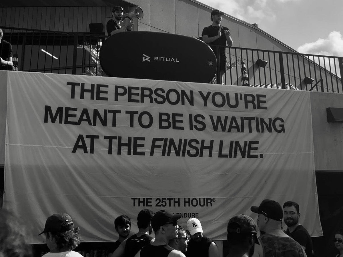 The banner at Beach Club Day 2026: The person you're meant to be is waiting at the finish line.