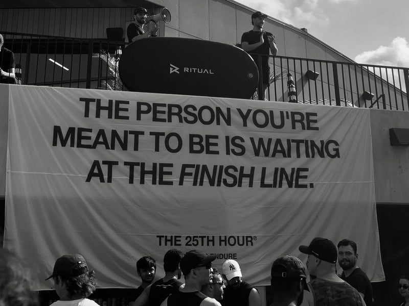 The banner at Beach Club Day 2026: The person you're meant to be is waiting at the finish line.