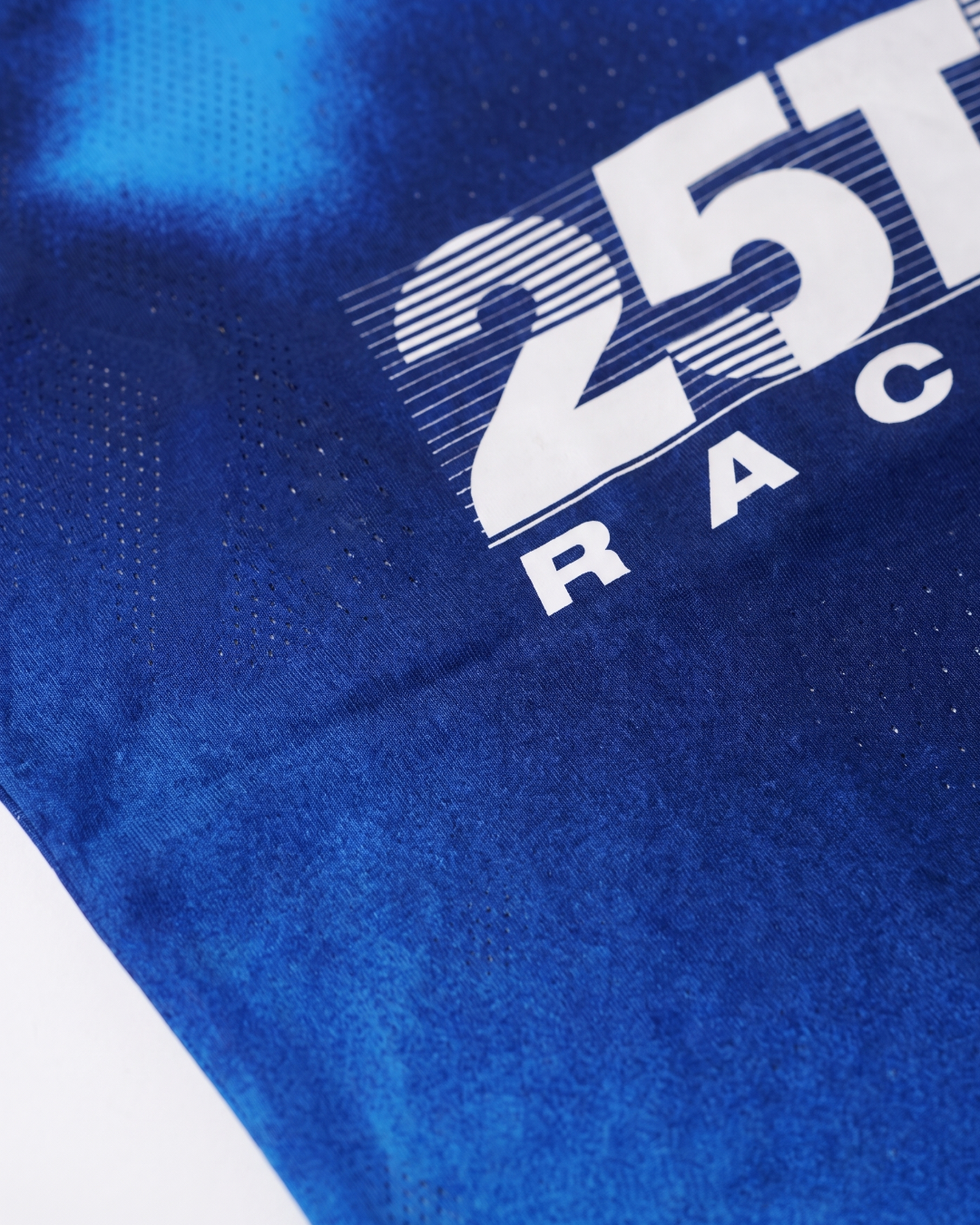 PR Night racing singlet, logo close up