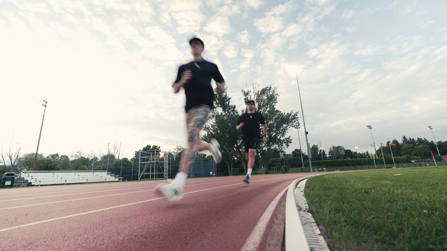 Runners on the bend at golden hour